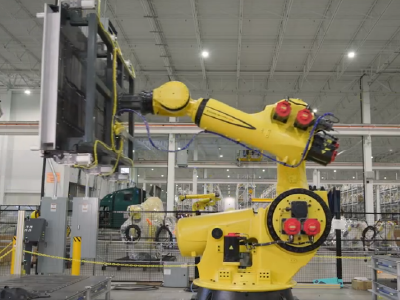 The FANUC M-1000iA will demonstrate EV battery conveyance during the assembly process.  The robot will showcase its vertical lifting capabilities and excellent motion performance as it stacks the batteries in a storage and retrieval system.  Extremely powerful, the M-1000iA has a 1,000kg payload, 4,297mm vertical reach and excellent motion performance.  An ideal choice for handling heavy products, the M-1000iA’s serial-link construction allows a wider range of motion in every direction. 