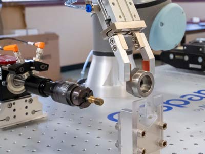 Thread verification is the latest enhancement to the Q-Span Gauging System. The robot arm loads parts into a fixture and activates the thread gauge to verify or chase threaded holes or external threads. The Q-Span System can then sort parts based on measured data, such as thread depth of blind holes, or reject parts for defects such as missing, short, or improperly formed threads. Systems can be configured for “GO” gaging, “NO GO” gaging, combination gaging, or even thread chasing.