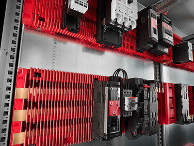 The RiLineX is a pre-assembled complete board containing standardized copper bars and is ready for immediate use. It provides contact hazard protection of up to IP 2XB, which can be extended to IP 3X with accessories. Various board lengths are available for different VX enclosure sizes. The modular system consists of basic and end modules as well as busbars. It may be assembled without tools and is flexibly adaptable. Configurations up to a maximum total length of 2400 mm are supported.