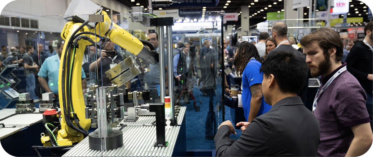 Automate show attendees' view robot arm on the show floor Automate show attendees' view robot arm on the show floor