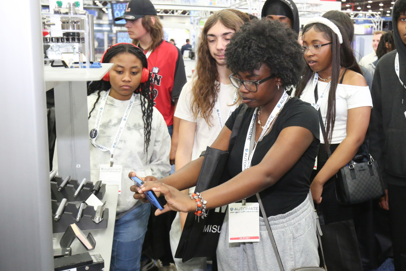Young students investigate an automation solution at Automate.